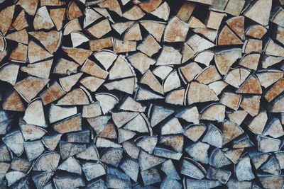 Full frame shot of logs in forest
