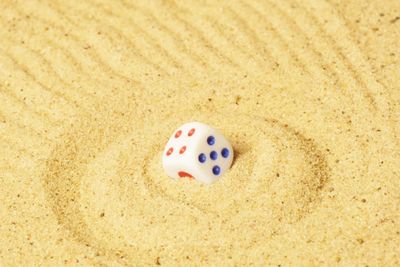 High angle view of ball on sand