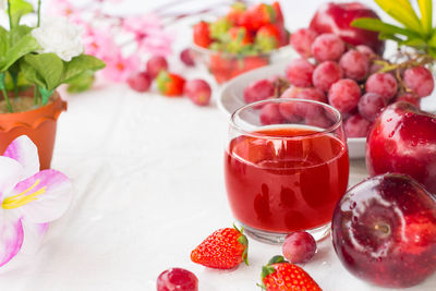 Close-up of strawberries in glass on table