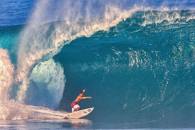 Man surfing in sea