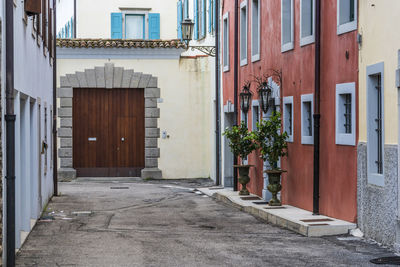 Alley amidst buildings in city