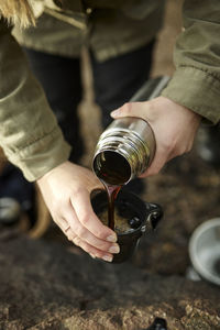 Cropped hand of man holding wineglass