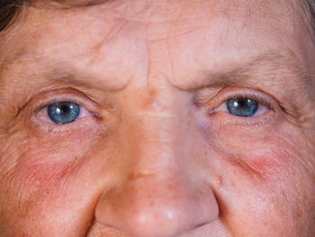 Cropped eyes of senior man