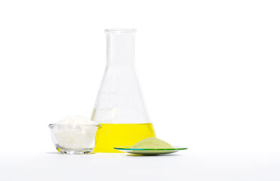 Close-up of drink against white background