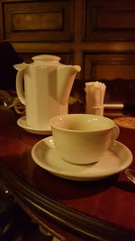 Close-up of coffee cup on table