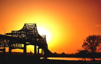 Sun shining through bridge