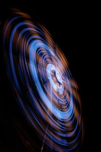 Abstract image of light painting against black background