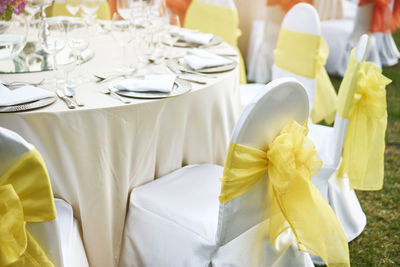 Place setting on dinning table during wedding ceremony