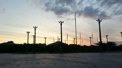 View of street light against cloudy sky