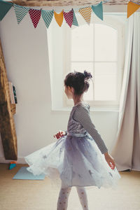 Girl playing at home