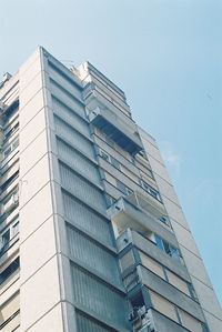 Low angle view of modern building against sky