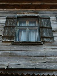 Low angle view of window of old building