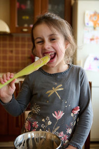 Young woman holding knife