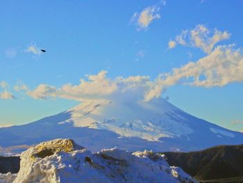 Aerial view of mountains against sky