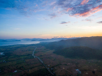 Aerial view of landscape against sky during sunset