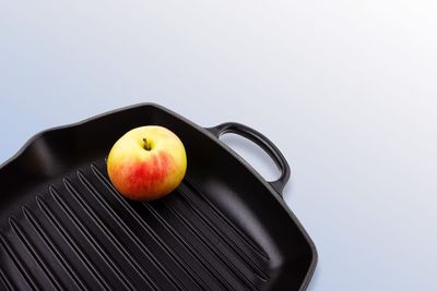 Close-up of apple against white background