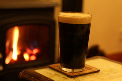 Close-up of beer glass on table