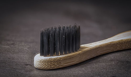 Close-up of paintbrushes on table