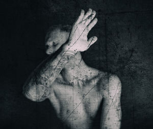 Digital composite image of hands against black background