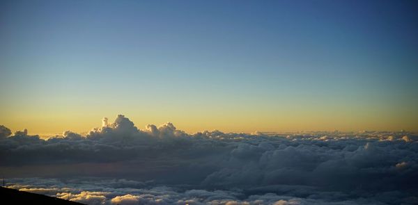 Scenic view of snow against sky during sunset