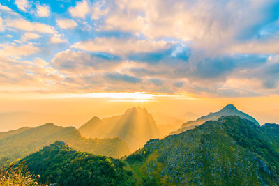 Panoramic view of mountains against sky during sunset