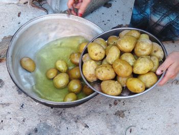 High angle view of person preparing food in bowl