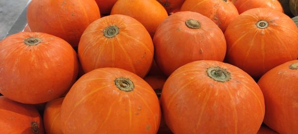 Full frame shot of pumpkins in market