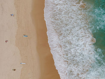 High angle view of sand on beach