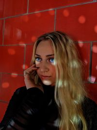 Portrait of beautiful young woman looking away