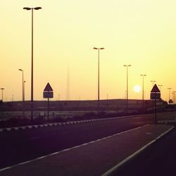 Empty road at sunset