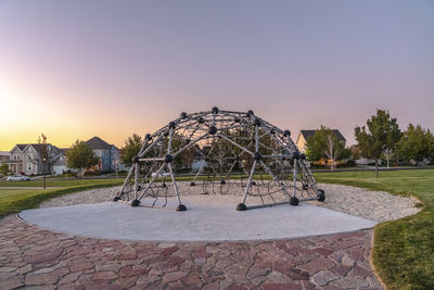 Built structure against sky during sunset