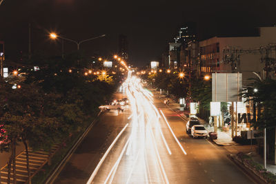 Light trails on city street at night