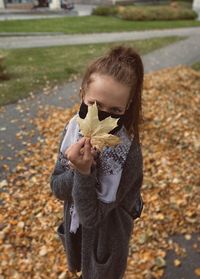 Close-up of girl holding ice cream cone