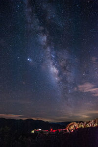 Scenic view of star field against sky at night