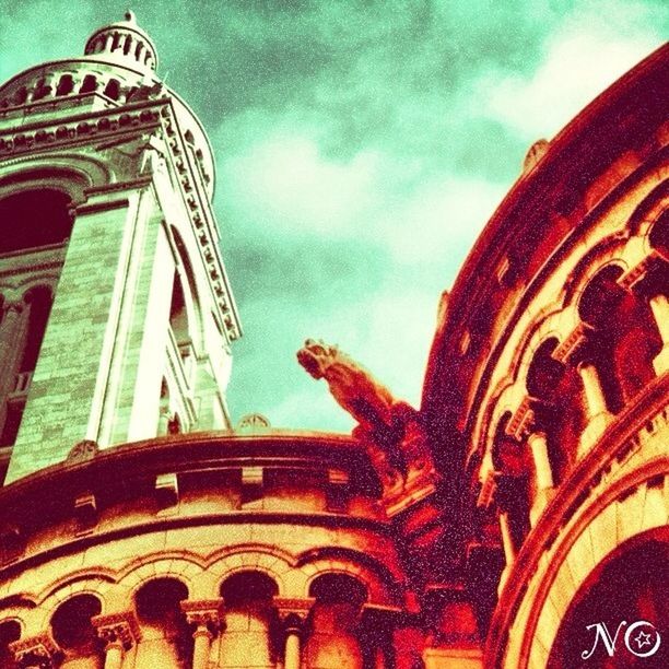 low angle view, architecture, place of worship, religion, built structure, sky, spirituality, building exterior, arch, church, history, cloud - sky, cathedral, famous place, travel destinations, ornate, dome, travel