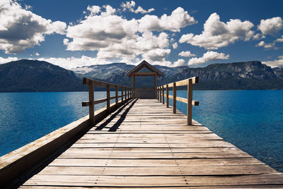 Pier over sea against sky