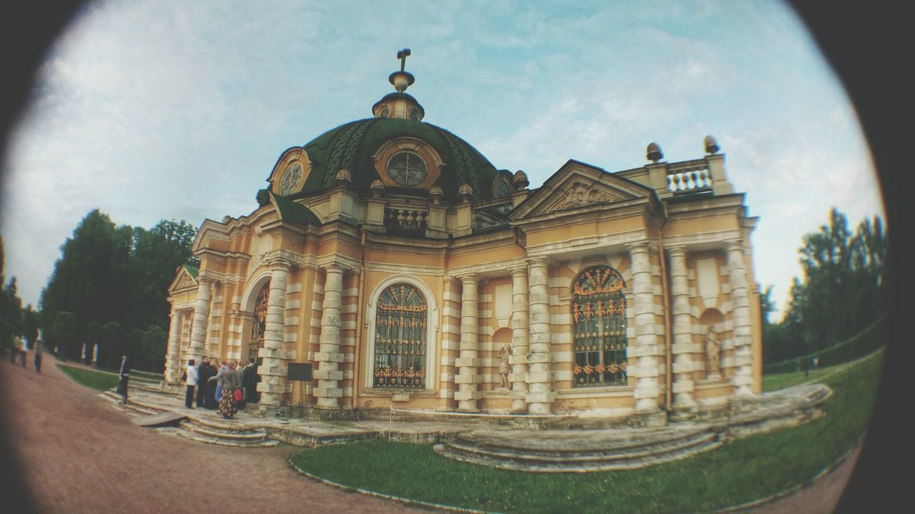 architecture, building exterior, built structure, sky, facade, cloud - sky, history, travel destinations, arch, famous place, travel, sculpture, dome, statue, place of worship, tourism, low angle view, religion, outdoors, incidental people