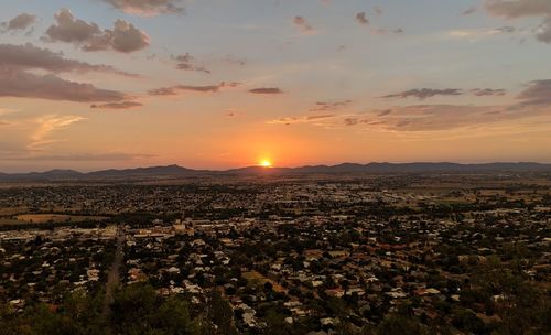 Scenic view of landscape against sky during sunset