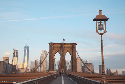 Brooklyn bridge against sky in city