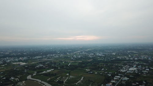 High angle view of buildings in city against sky