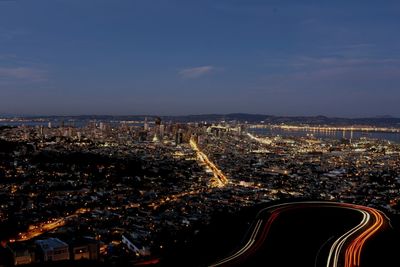 Aerial view of illuminated cityscape at night