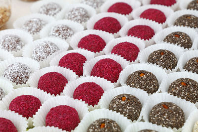 Full frame shot of various colorful chocolates in cupcake holder