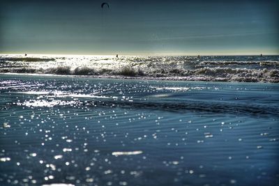 Scenic view of sea against sky in city