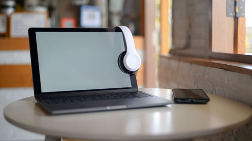 Close-up of laptop on table