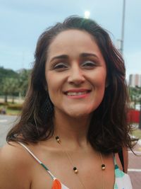 Close-up portrait of smiling beautiful woman