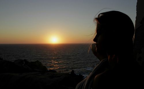 Scenic view of sea at sunset