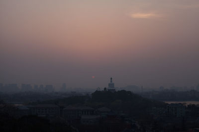 View of cityscape at sunset