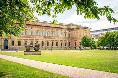 Lawn by building against sky, alte pinakothek