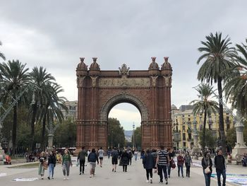 Group of people in front of historical building