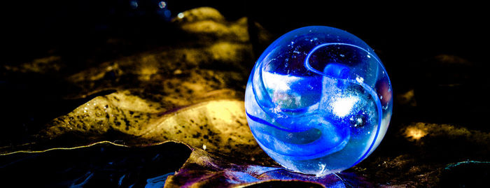 Close-up of illuminated blue water